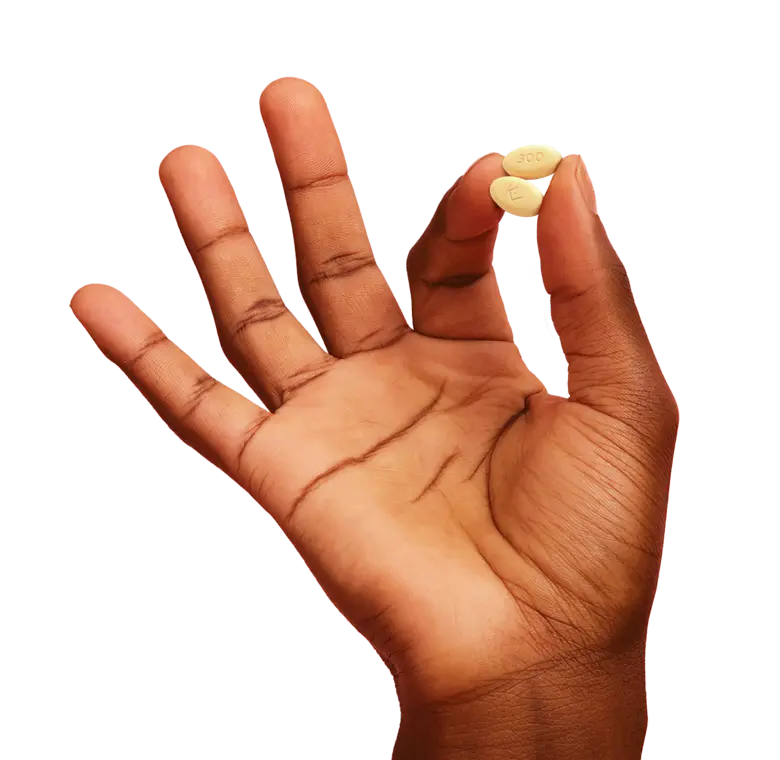 Hand holding an EKTERLY® (sebetralstat) tablet