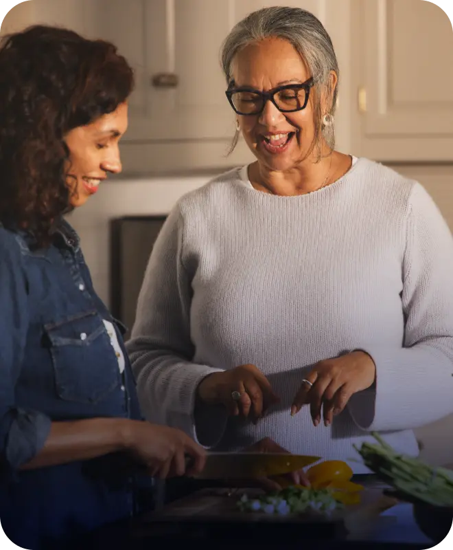 Hypothetical EKTERLY® (sebetralstat) patient speaking to a friend in an indoor setting